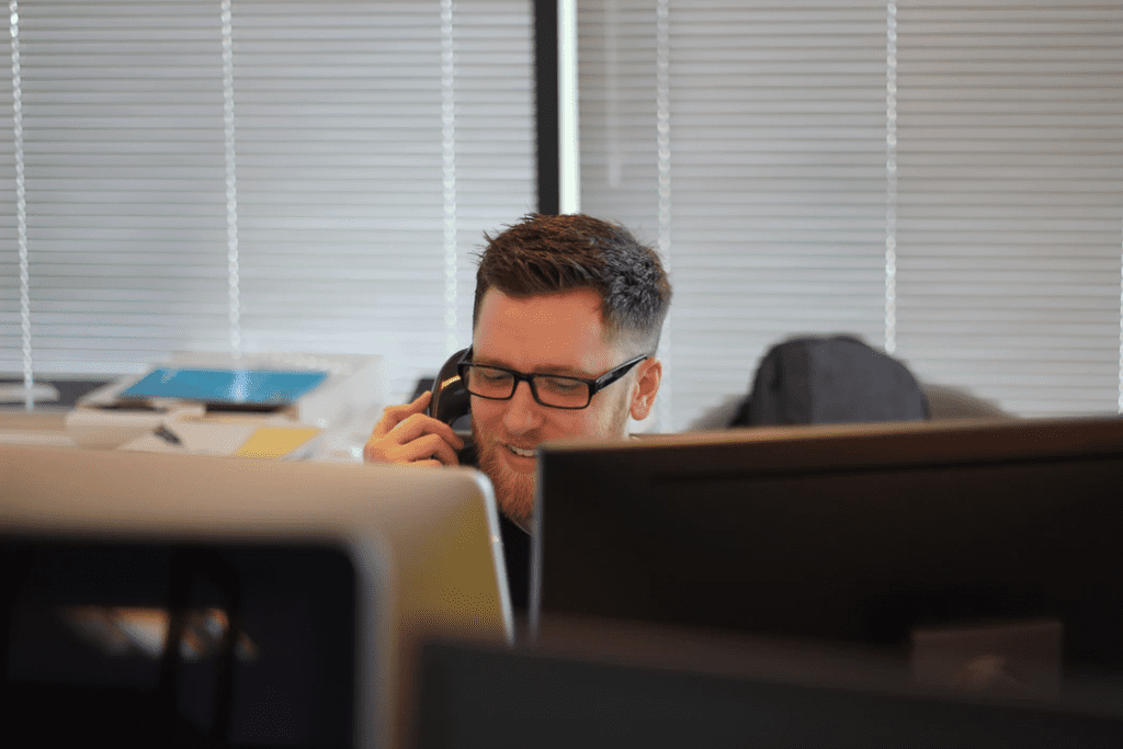 man working in call center management