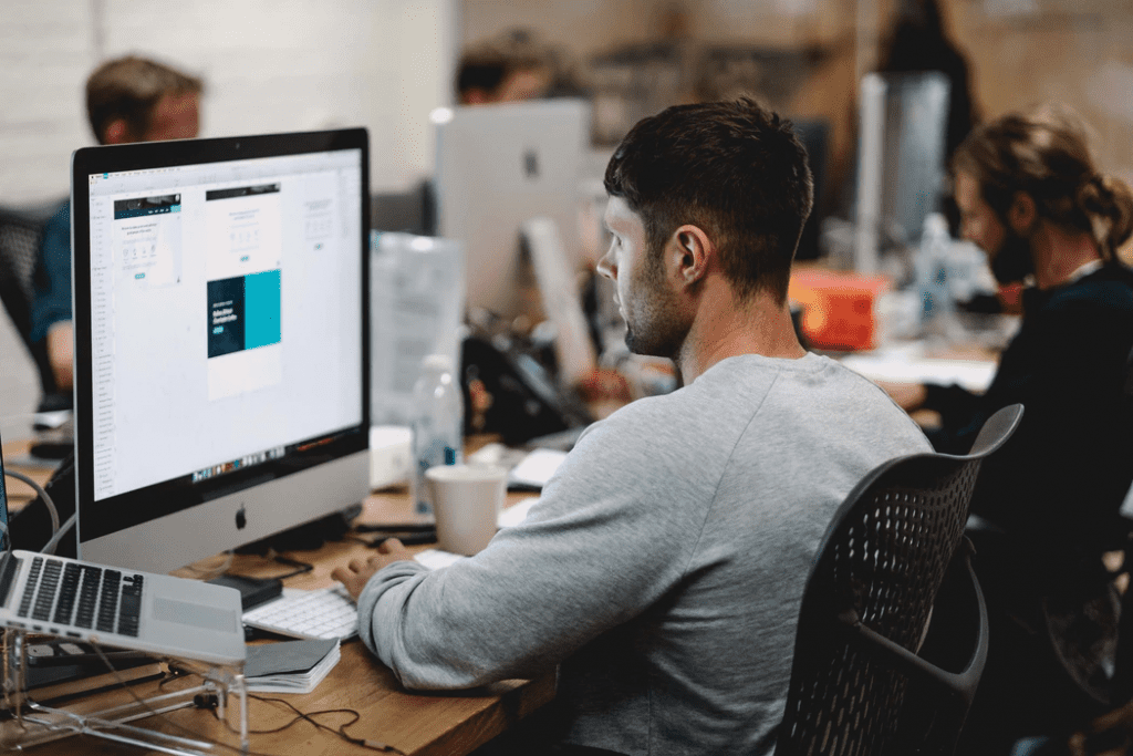 man using technology in call center management