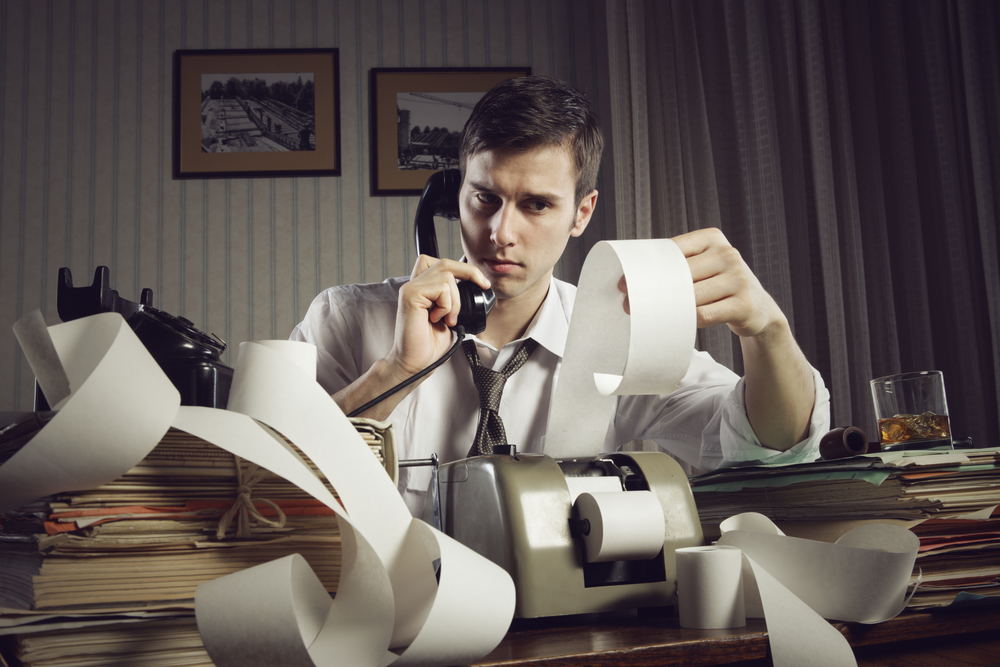 Man preparing taxes for restaurant accounting