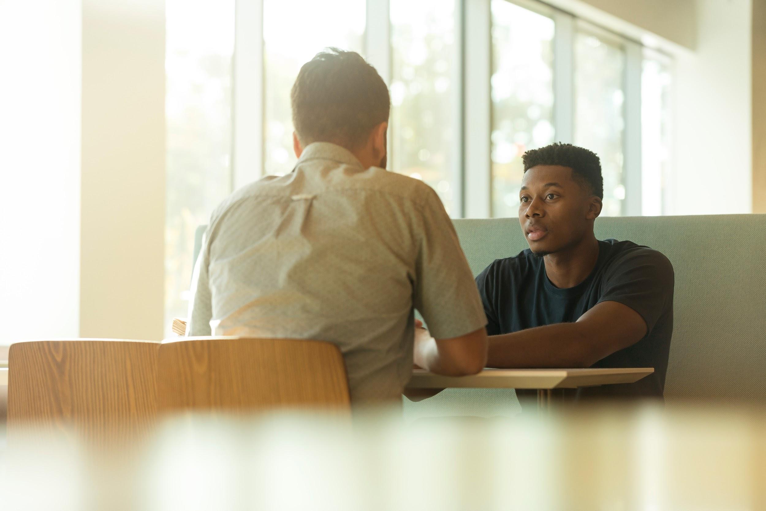 Manager and employee discussing development plan