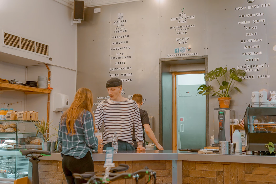 Worker at a restaurant dealing with an angry customer