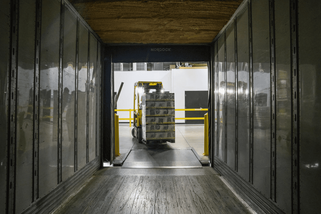 using a forklift to move different types of inventory