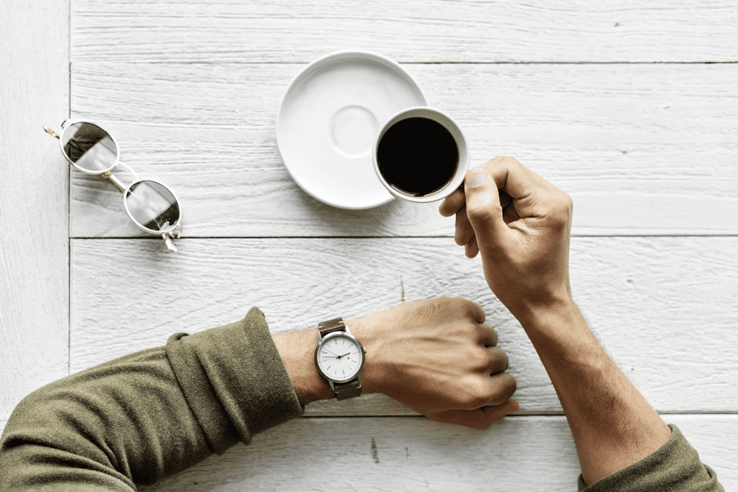 Business manager checking his watch