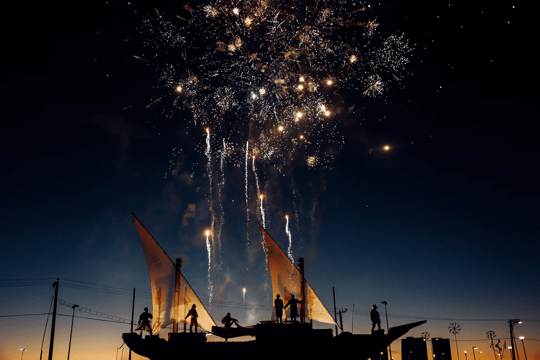 Fireworks coming from a boat as part of a business's grand opening ideas