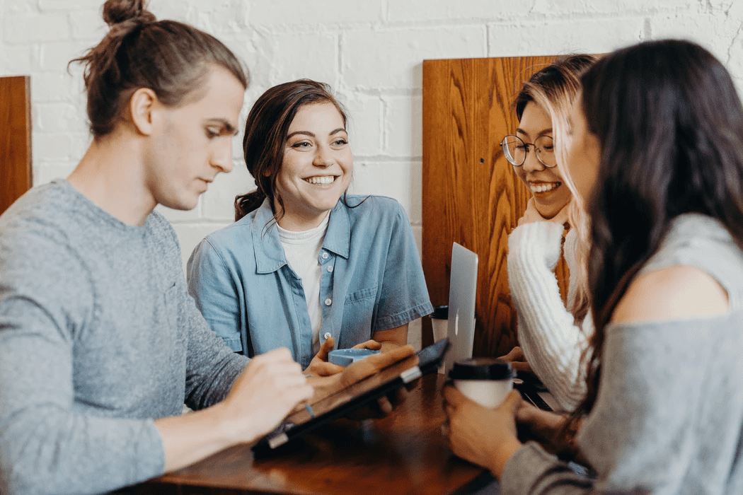 coworkers having a meeting over coffee