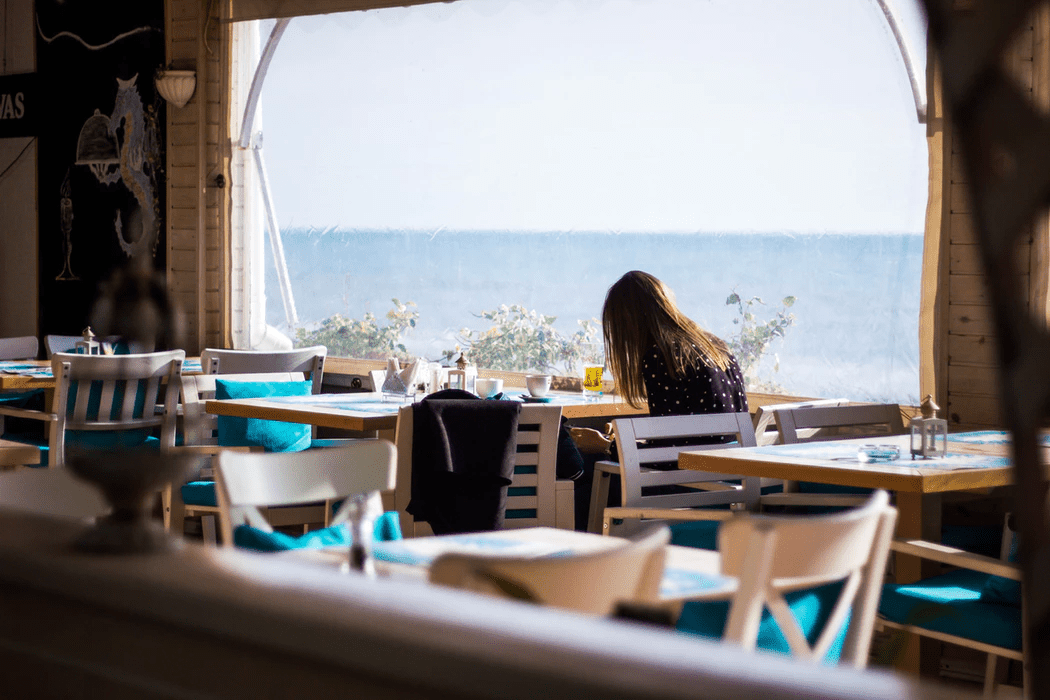 woman working an alternative work schedule at a restaurant