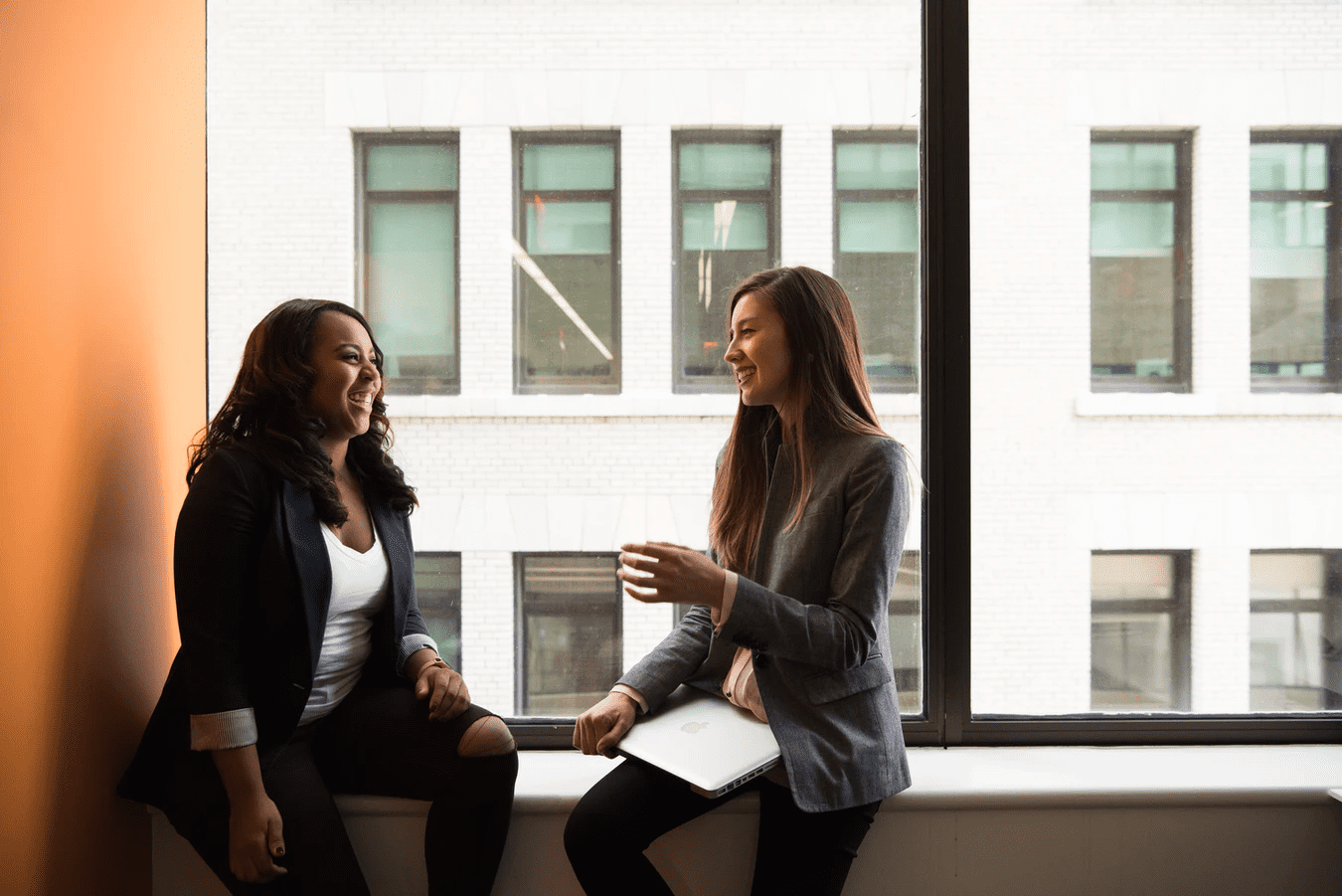 Two people discussing workforce management