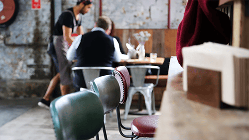 A restaurant worker displaying good interpersonal skills