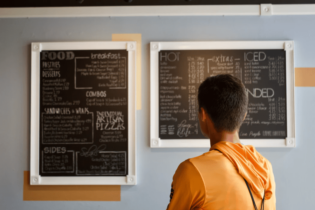 Menu boards on wall after menu engineering