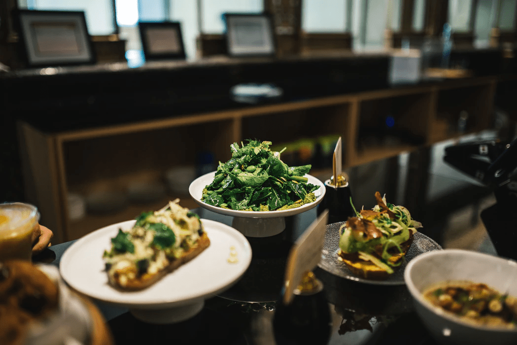 dishes of food on a table in a nice restaurant