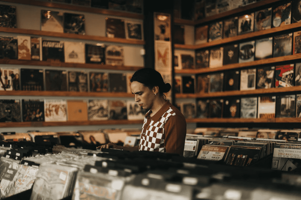 Person working at a record store