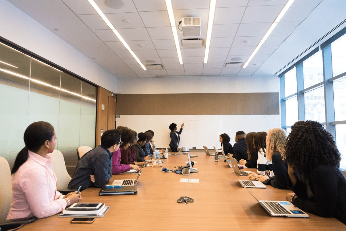 Employees having a meeting in a conference room