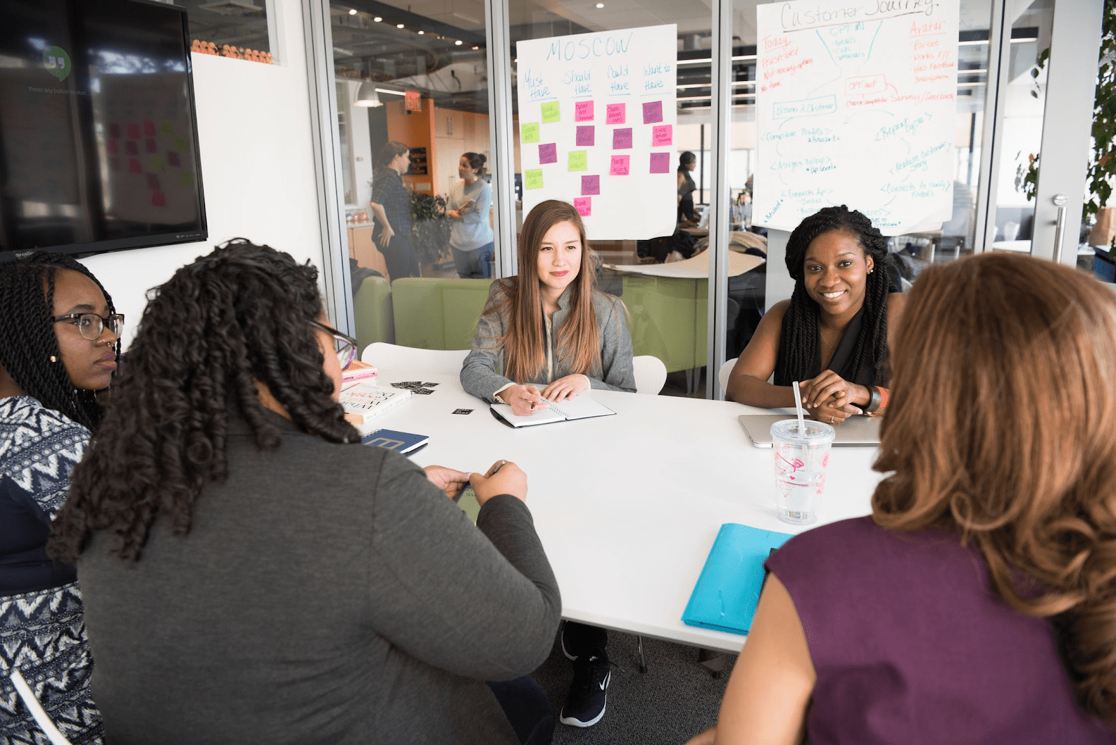 Ladies having a teem meeting at work