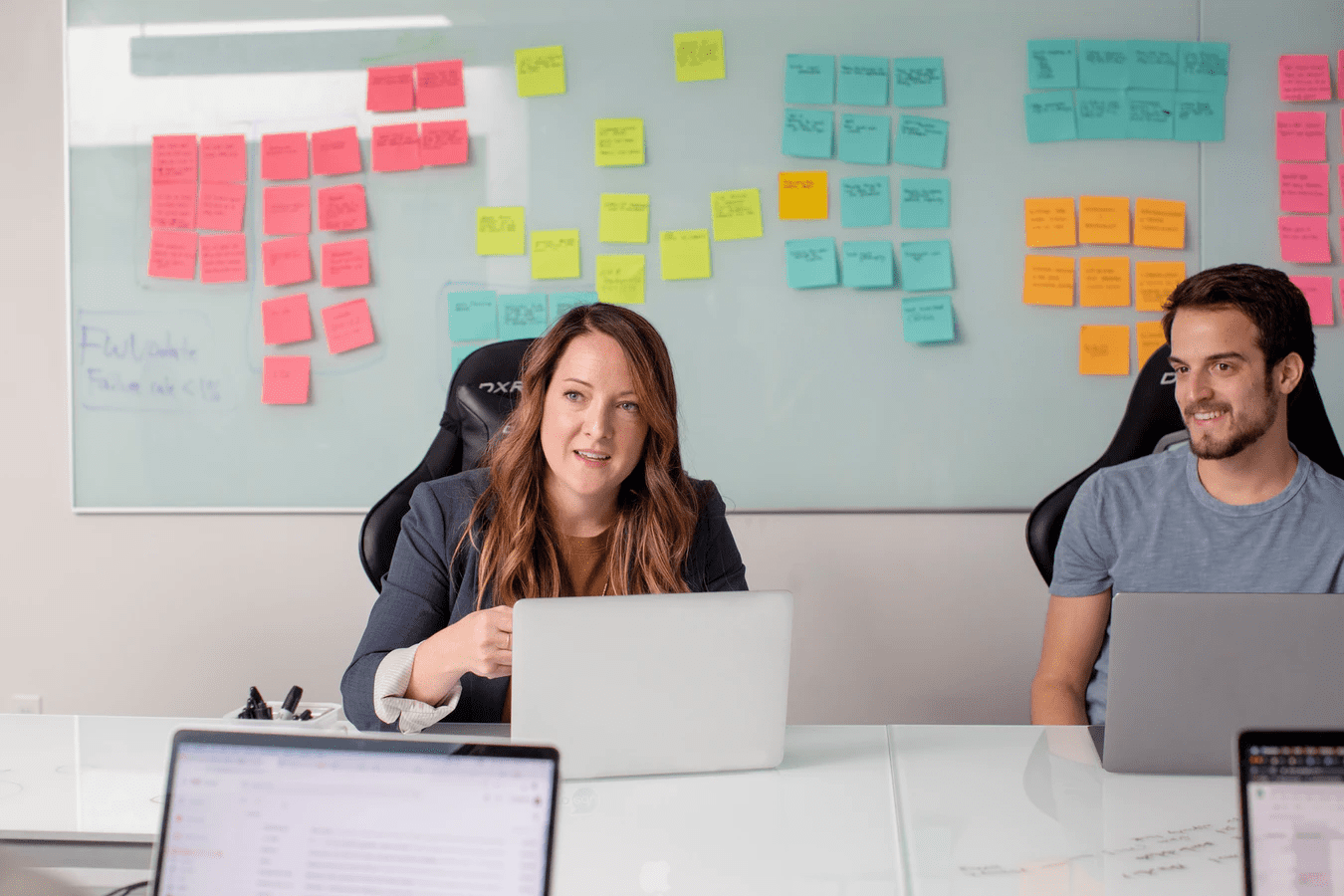 Two Coworkers doing human resource planning 