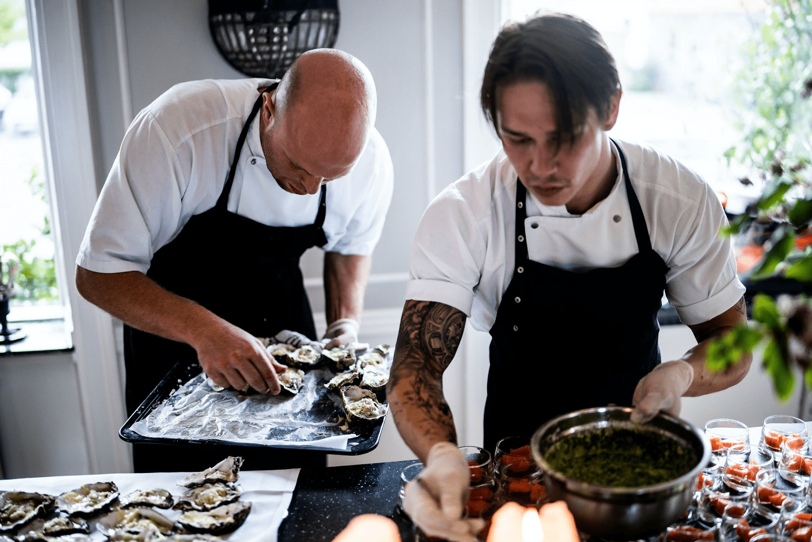 coworkers preparing food in a restaurant