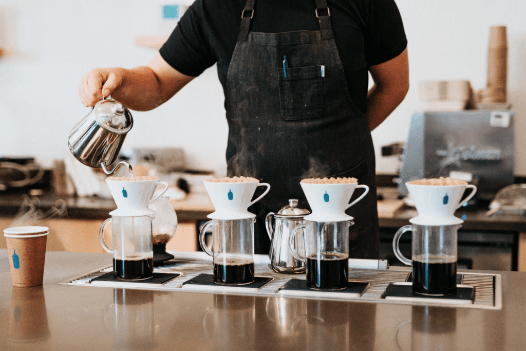 Employee pouring coffee thinking about what is comp time?