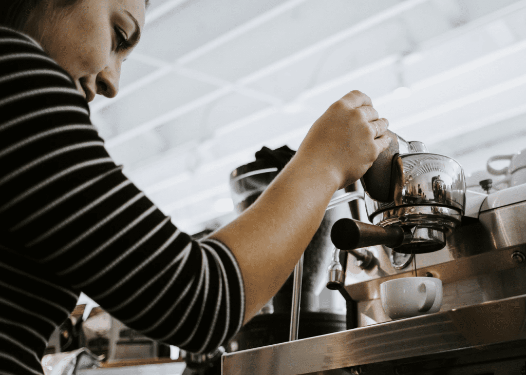 FLSA exempt employee making an espresso at a coffee shop