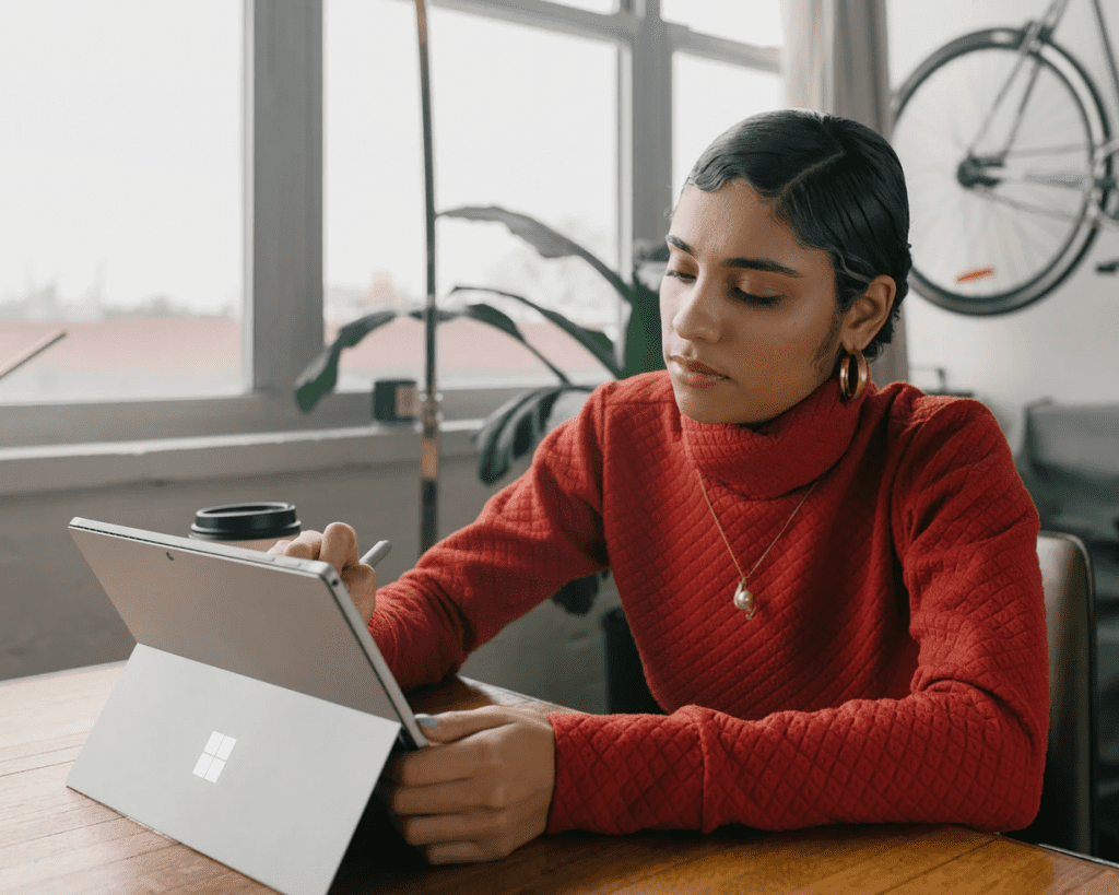 A contingent worker using a tablet to do remote work