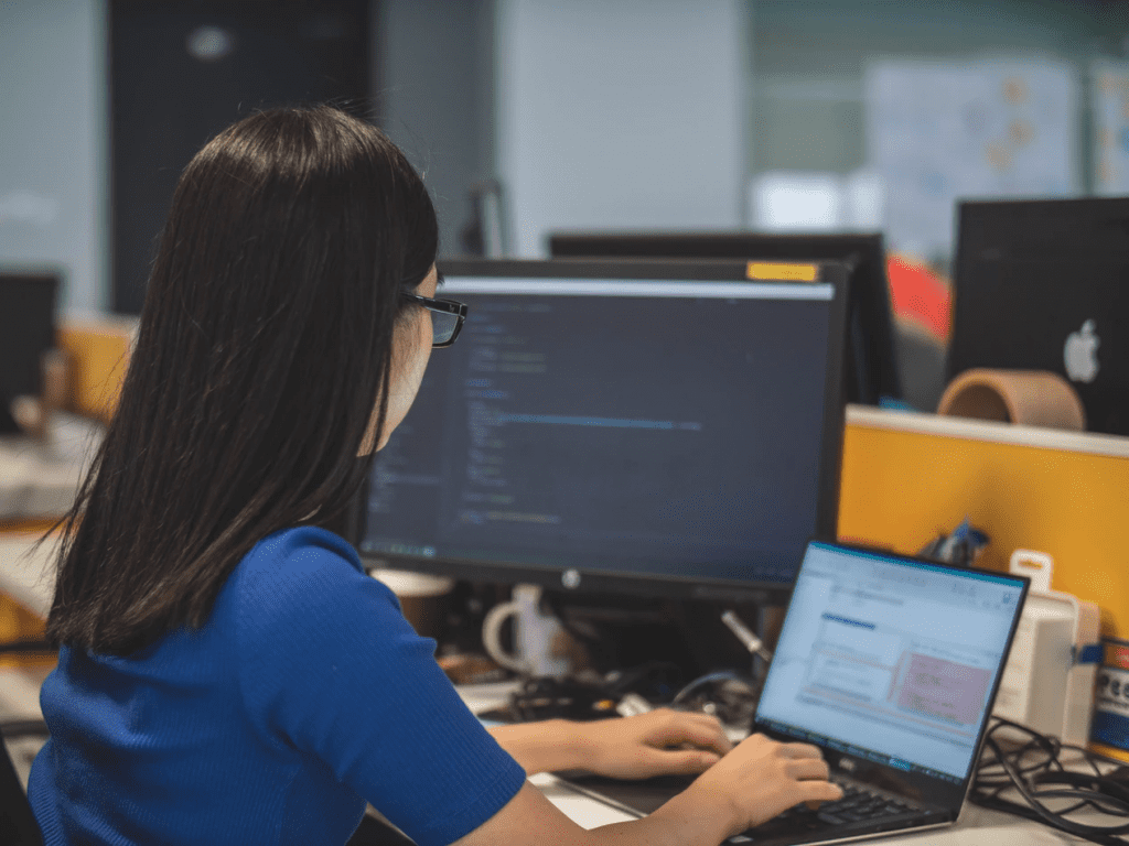 Employee doing Field Service Management  from a desk