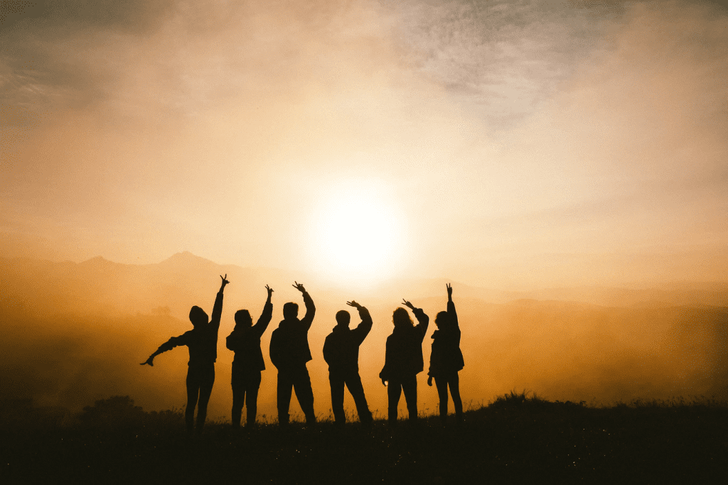 Silhouette of people who are hiking