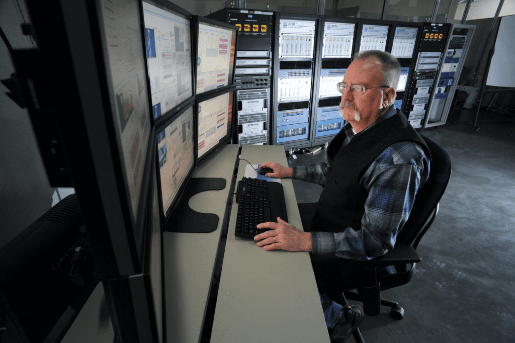 man at computer working