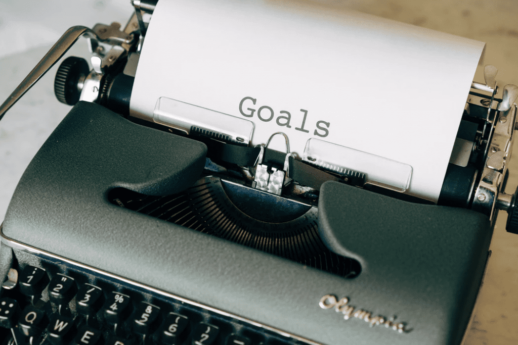 Type writer with business goals list