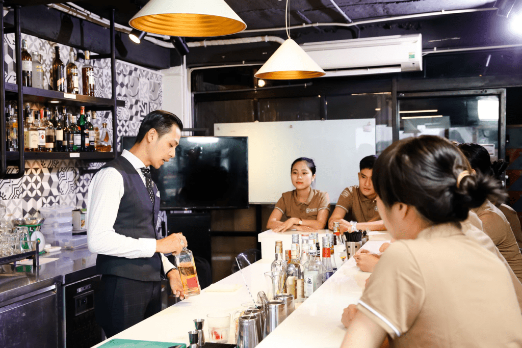 salaried employees learning how to make cocktails