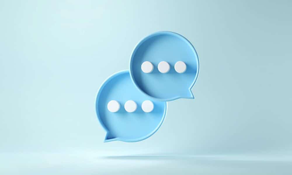Two chat bubbles representing  employee communication