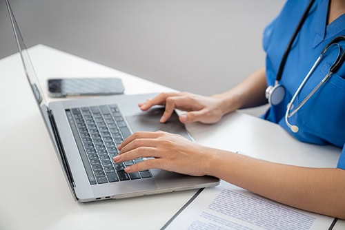 Nurse working on a schedule