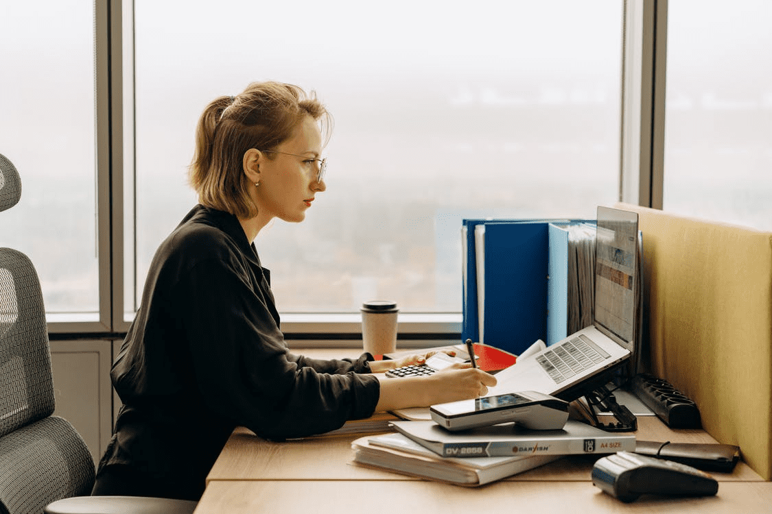 Woman working on a payroll software