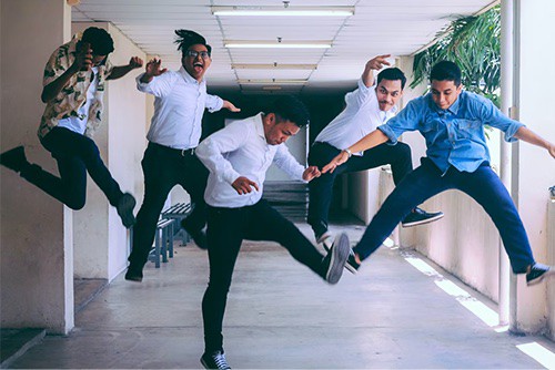Employees jumping up for a fun picture