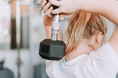 Woman lifting weights