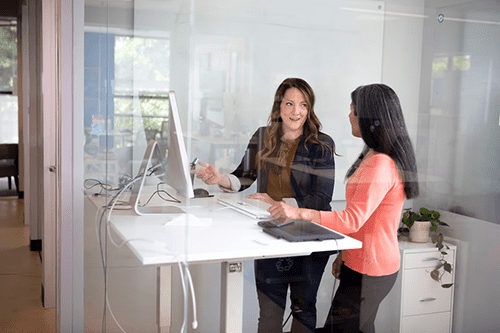 two team members working together 