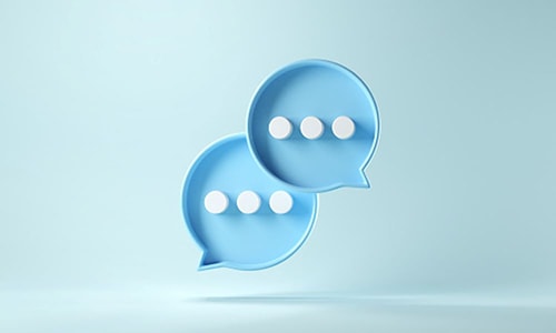 Two chat bubbles representing  employee communication