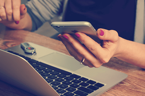 woman working on her laptop doing shift planning