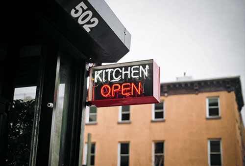 restaurant sign reading kitchen open