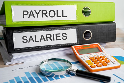 Managing payroll: In-house vs. outsourced