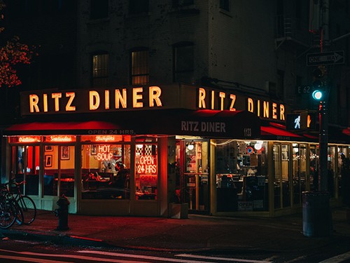 Ritz Diner neon sign at night, in the Upper East Side, Manhattan
