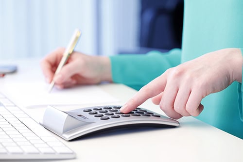 woman using a calculator